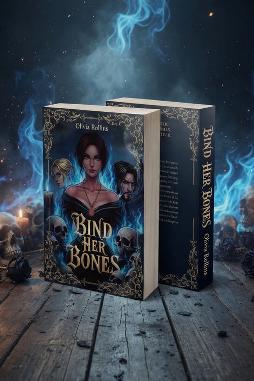 A book titled "Bind Her Bones" by Erica Rafferty is displayed standing upright on a rustic wooden surface, with a second copy leaning behind it. The cover art features a dark fantasy illustration with a woman, a man, skulls, and glowing blue smoke in the background.